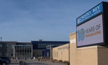Parents and students found out a former security coordinator at Cristo Rey Jesuit High School had been charged with invasion of privacy using a surveillance device.