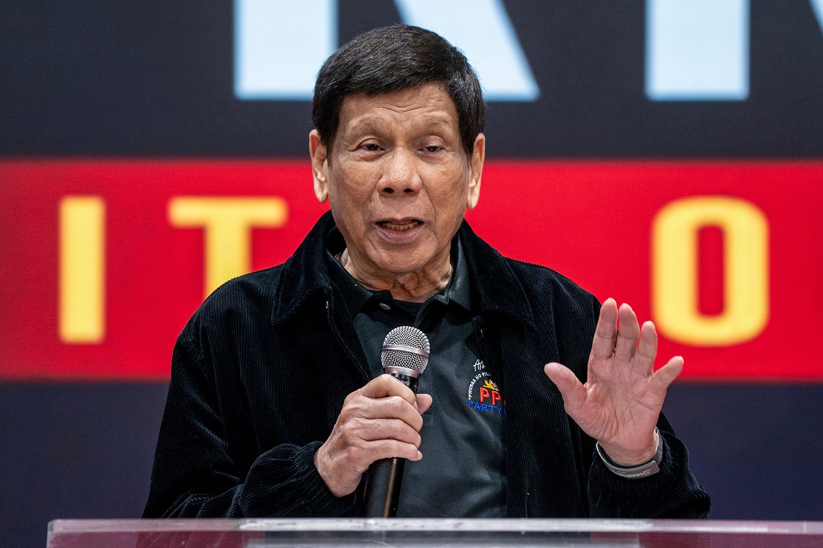 <i>Vernon Yuen/AP via CNN Newsource</i><br/>Rodrigo Duterte speaks at a rally on March 9. Former Philippine President Rodrigo Duterte has been put on a plane to The Hague following his arrest on an International Criminal Court (ICC) warrant