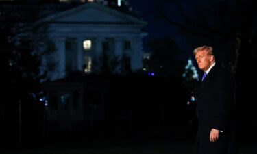 President Donald Trump walks to the White House on March 9 in Washington