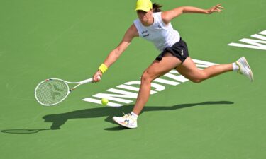 Iga Świątek celebrates defeating Karolína Muchová in the fourth round of the BNP Paribas Open at Indian Wells on March 11.