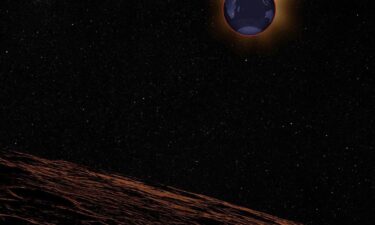 The flower moon lunar eclipse is seen over NASA’s Michoud Assembly Facility in New Orleans in a composite of seven images that show the partial eclipse and totality