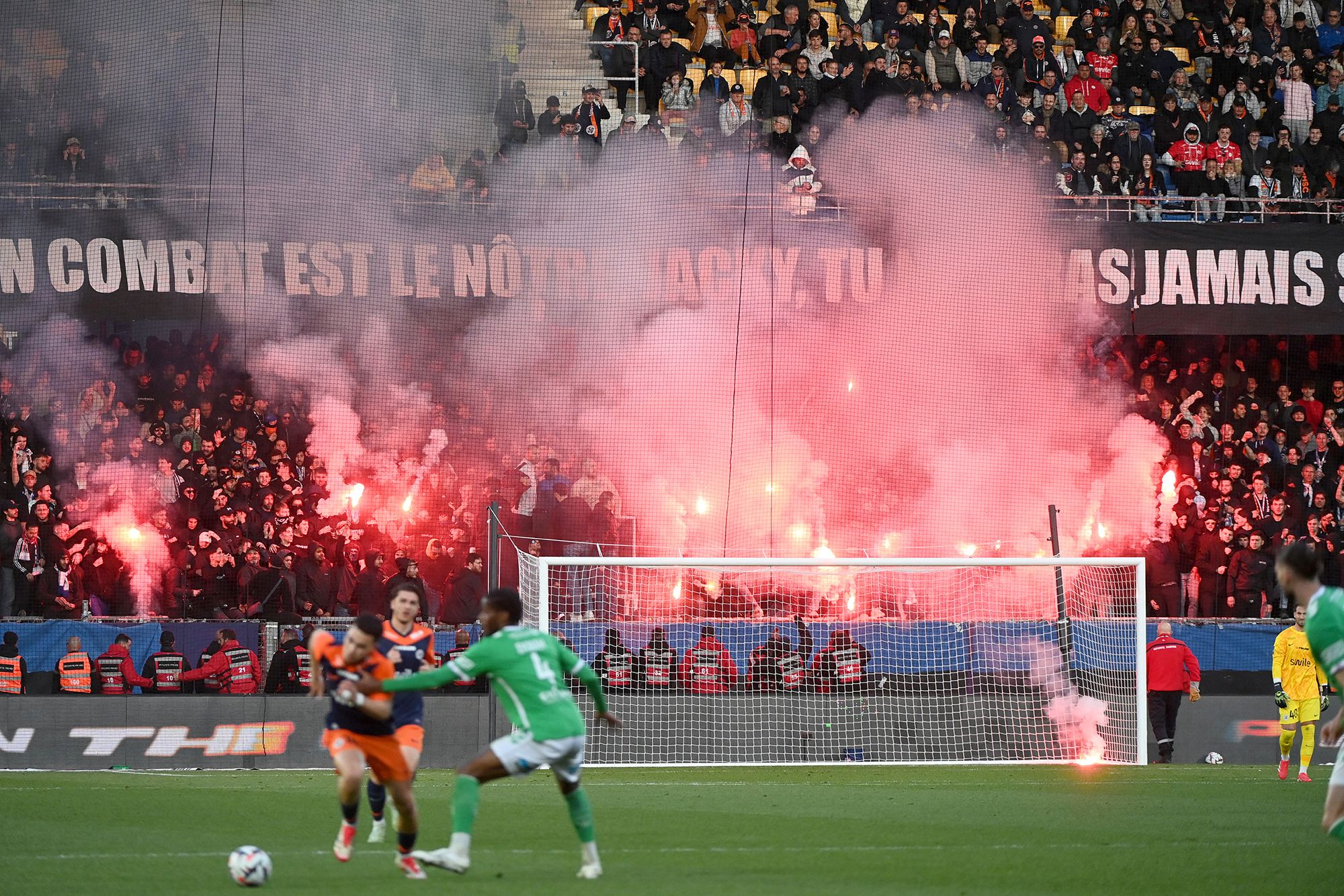 <i>Sylvain Thomas/AFP/Getty Images via CNN Newsource</i><br/>Montpellier supporters light flares during the match against Saint-Étienne at the Stade de la Mosson on March 16.