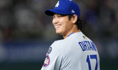 Ohtani celebrates his double in the ninth inning.