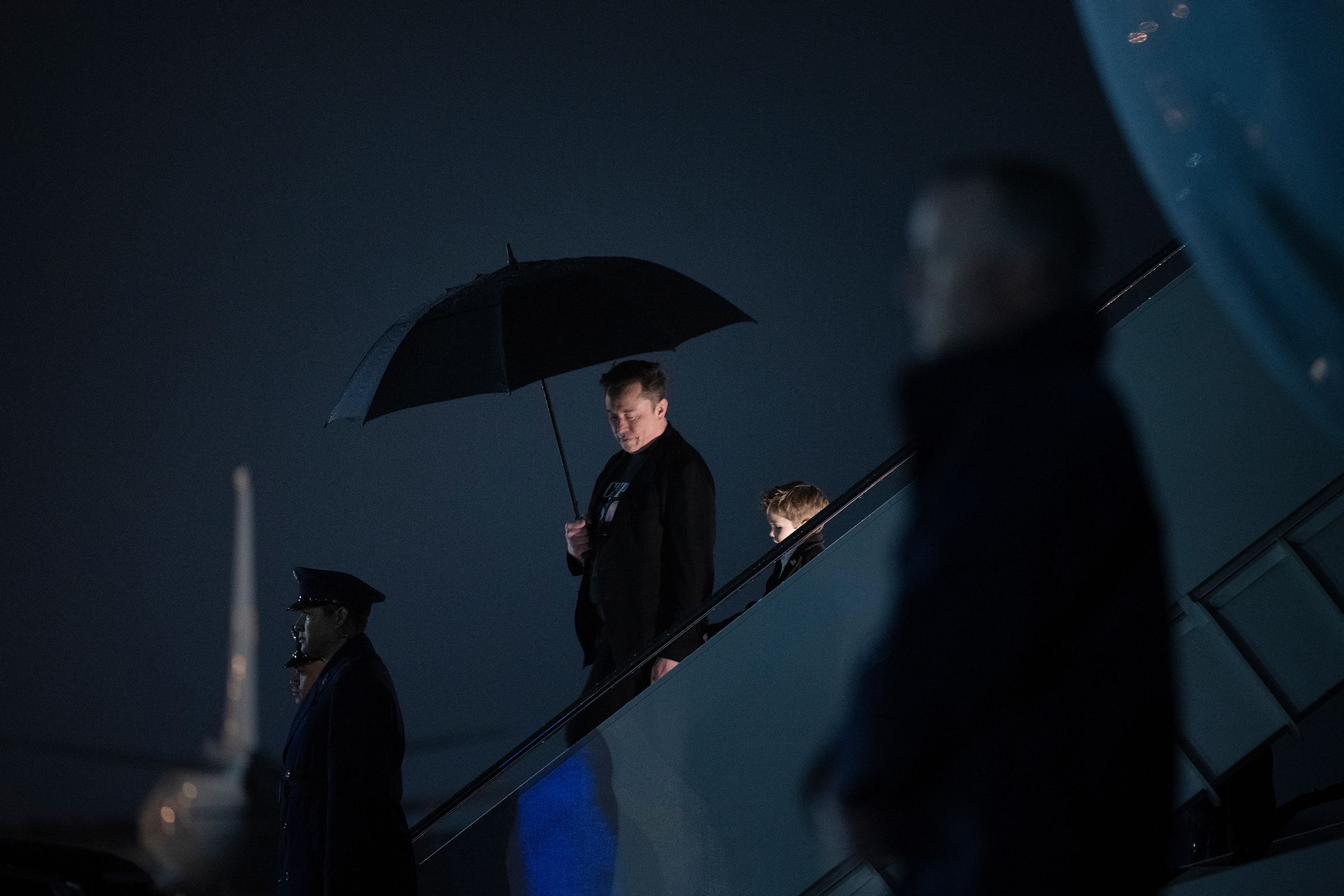 <i>Brendan Smialowski/AFP/Getty Images via CNN Newsource</i><br/>Elon Musk and his son X Æ A-12 step off of Air Force One upon arrival at Joint Base Andrews in Maryland