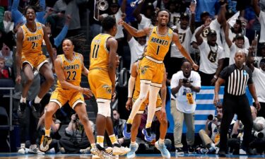 Alabama State guard Amarr Knox celebrates with teammates after making the would-be game winning laup against St. Francis (PA) in the First Four game.