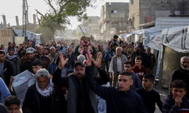 Palestinians attend a rally calling for an end to the war in Beit Lahia