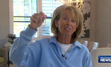 The gator left a mark on a chair and left the Quinns a souvenir: two of its teeth!