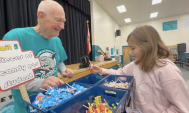 "Grandpa Bob" delivers sweets and smiles at Carwise Middle School in Palm Harbor. Retiree Robert Walker
