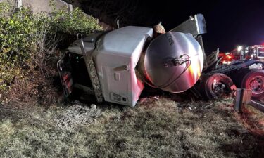A tractor trailer carrying 6