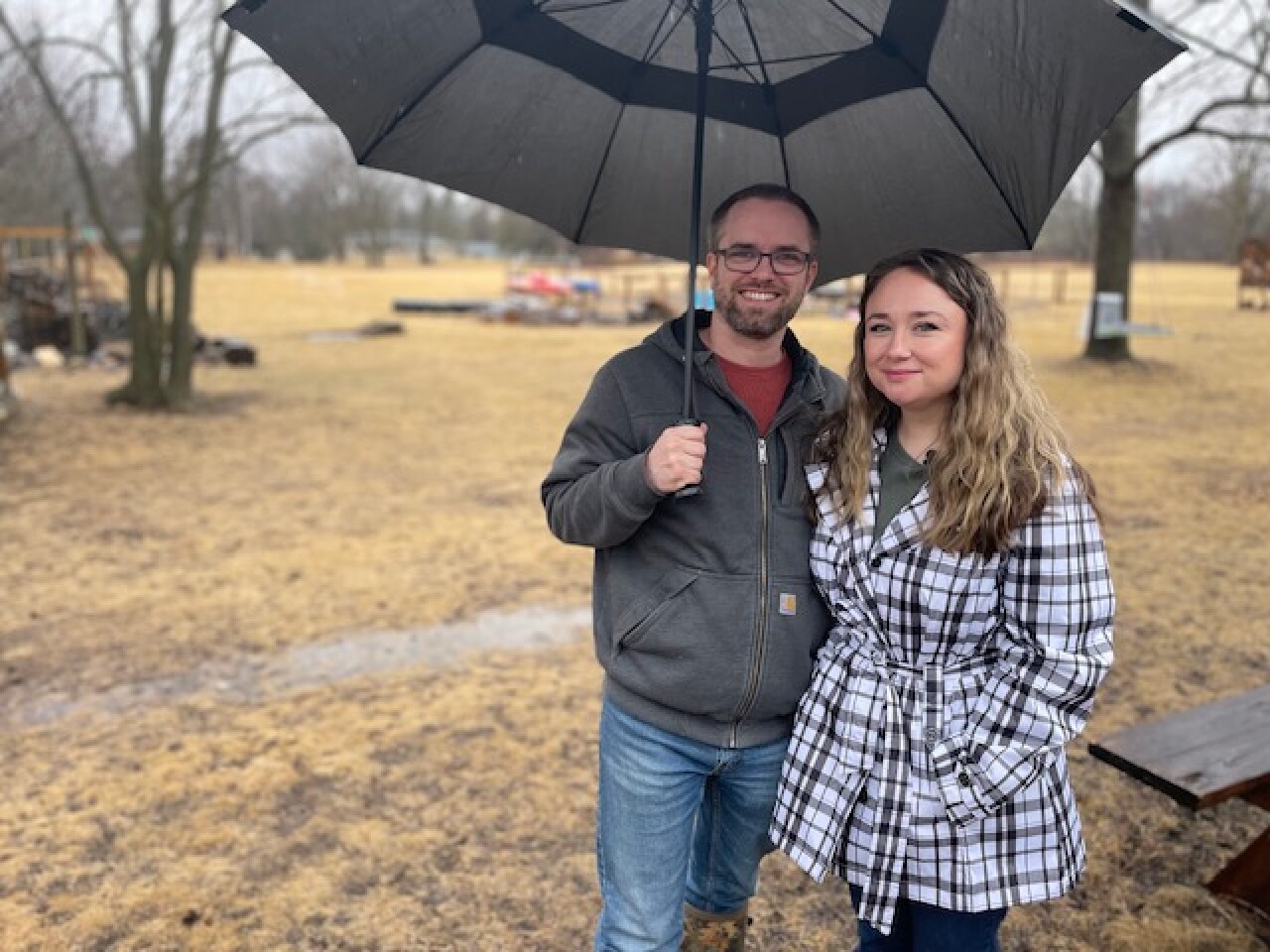 <i>WTMJ via CNN Newsource</i><br/>Jennifer Sleider and her husband stand on their 2-acre property in Brookfield. They hope a state law passes so they can get backyard chickens.