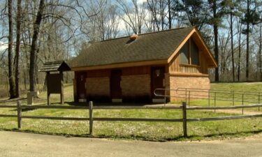 A woman and her boyfriend sheltered against an EF-1 tornado in a roadside bathroom in Chickasaw County.