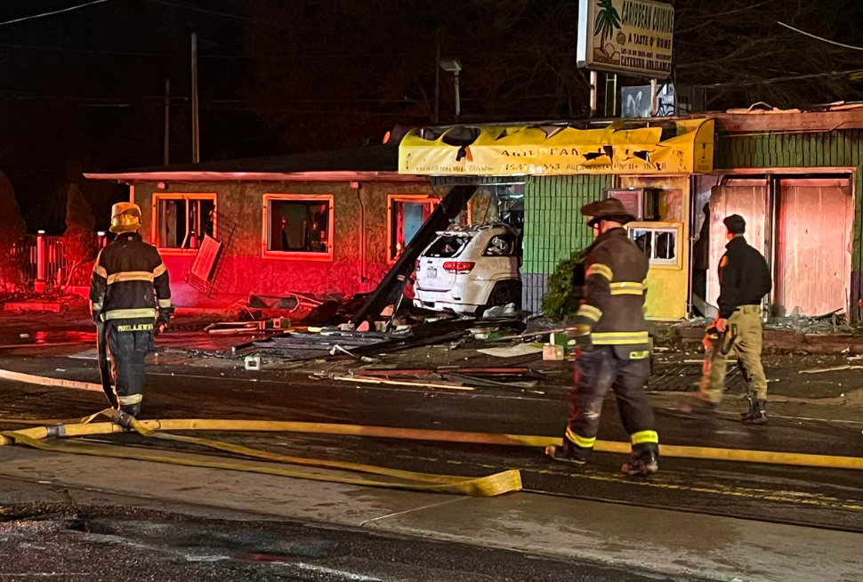 <i>KYW via CNN Newsource</i><br/>A car plowed into the Caribbean Cuisine restaurant and set fire to the building on April 14.