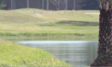 A Melbourne woman has been arrested and charged after allegedly holding two teenagers at gunpoint for fishing near her backyard