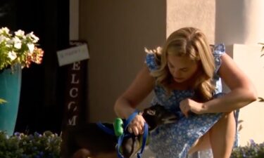 A Seminole County woman says she and her dog were saved by a bag of cookies when a bear attacked them last week. Kristen Savage told WESH 2 she was walking her dog