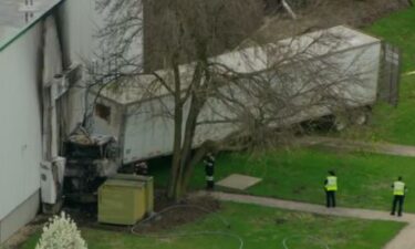 A semi truck crashed into a building and caught fire Wednesday afternoon in suburban West Chicago