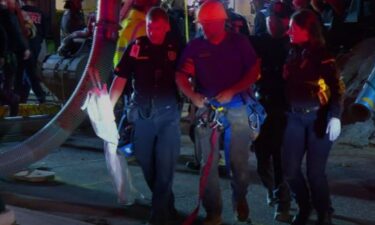 A drain worker is getting medical treatment after he spent most of the night stuck in a 14-foot hole in south Minneapolis.