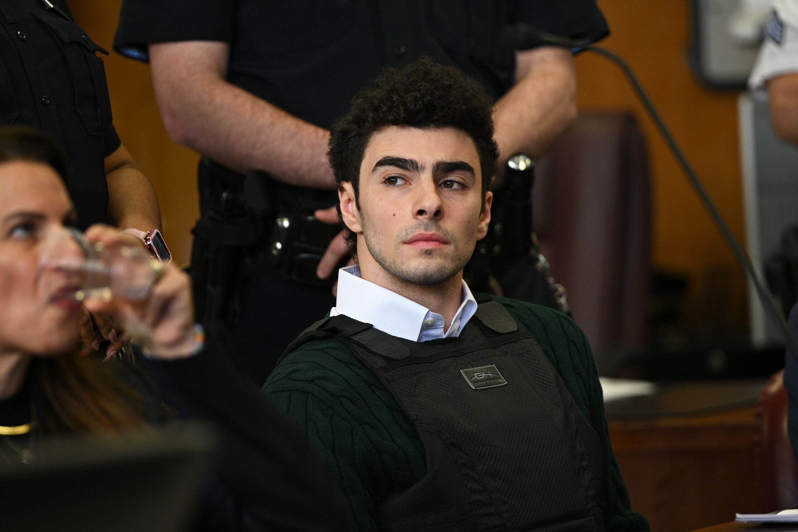 <i>Curtis Means/Pool/Getty Images via CNN Newsource</i><br/>Luigi Mangione appears at a hearing for the murder of UHC CEO Brian Thompson at Manhattan Criminal Court on February 21