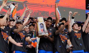 Florida celebrates after beating Houston in the national championship at the Final Four of the NCAA college basketball tournament.