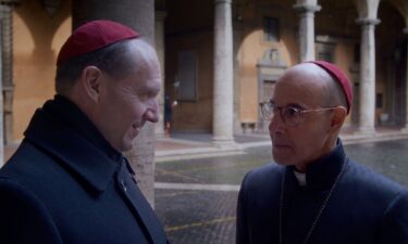 Ralph Fiennes as Cardinal Lawrence and Stanley Tucci as Cardinal Bellini in director Edward Berger's "Conclave."