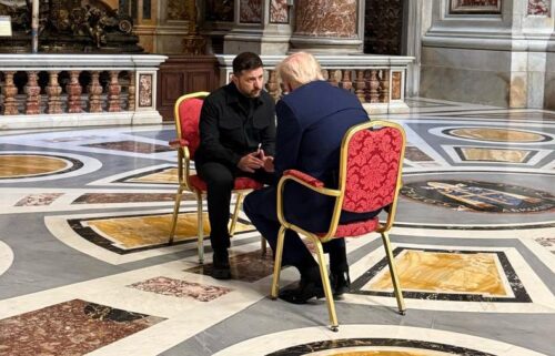 French President Emmanuel Macron and British Prime Minister Keir Starmer huddle with Trump and Zelensky in St. Peter's Basilica on Saturday ahead of the funeral.