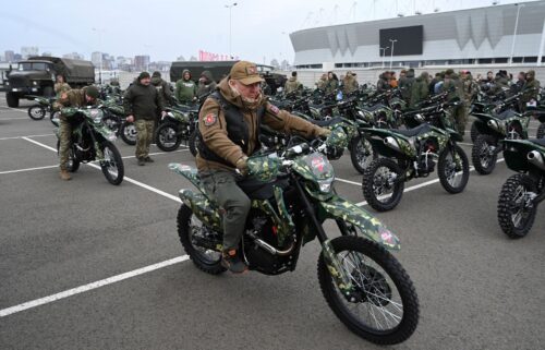 Participants attend a ceremony to hand over new motocross bikes to the Russian military near a football stadium in Rostov-on-Don