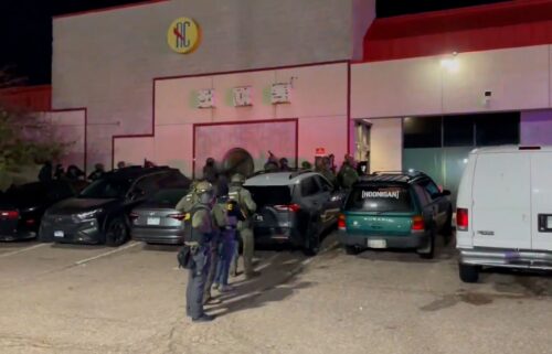 More than 100 people were detained in Colorado Springs following an overnight raid at what authorities described as an underground nightclub in a strip mall