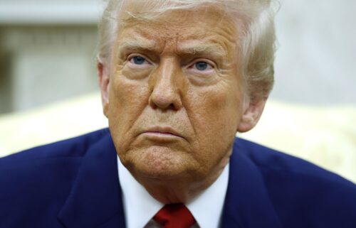 President Donald Trump answers a reporters question during a meeting with Israeli Prime Minister Benjamin in the Oval Office of the White House on April 7