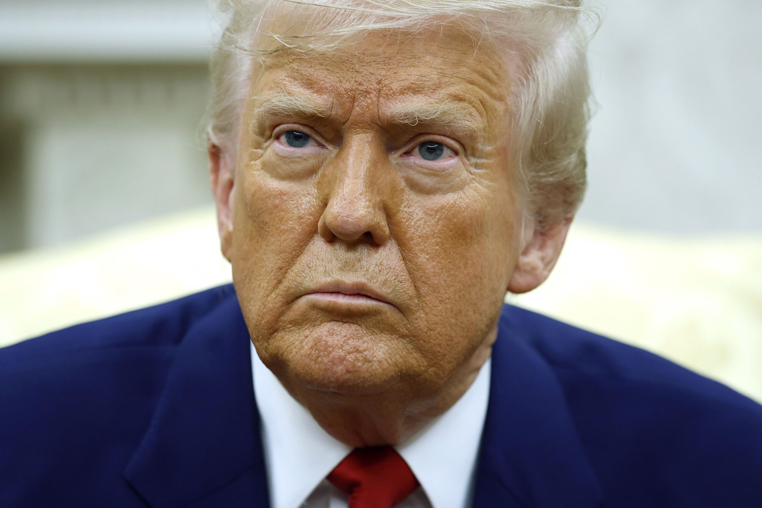 <i>Kevin Dietsch/Getty Images via CNN Newsource</i><br/>President Donald Trump answers a reporters question during a meeting with Israeli Prime Minister Benjamin in the Oval Office of the White House on April 7