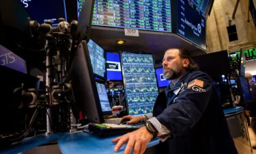A trader works on the floor of the New York Stock Exchange.
