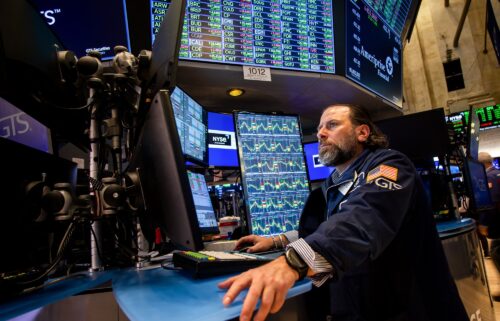 A trader works on the floor of the New York Stock Exchange.