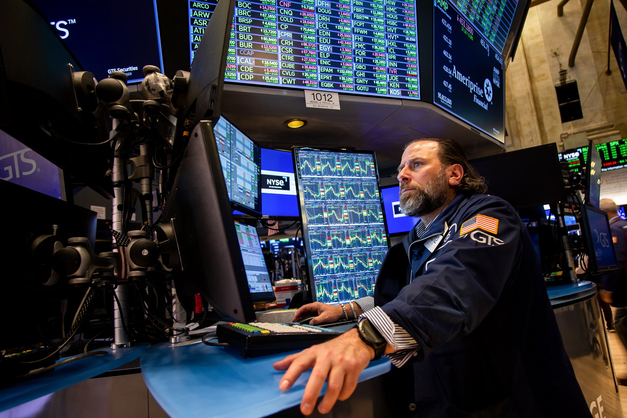 <i>Michael Nagle/Bloomberg/Getty Images via CNN Newsource</i><br/>A trader works on the floor of the New York Stock Exchange.