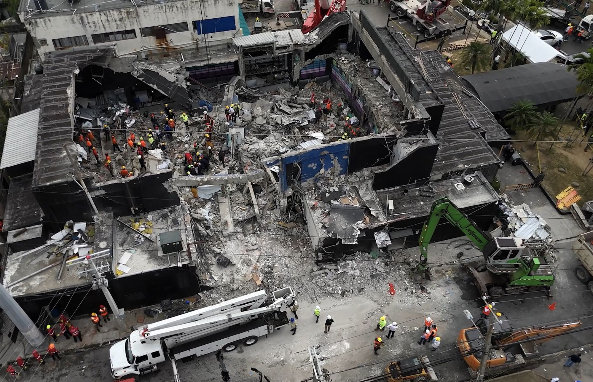 <i>Marvin Del Cid/AP via CNN Newsource</i><br/>Rescue workers recover the body of a victim who died in Tuesday's tragedy.