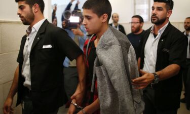 Ahmed Manasra leaves the District Court in Jerusalem after his sentencing hearing in November 2016.