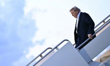 President Donald Trump steps off Air Force One in West Palm Beach