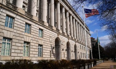 A US flag flutters outside the Internal Revenue Service (IRS) building in Washington