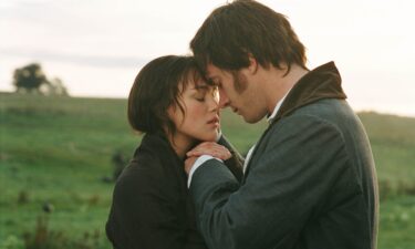Mr. Darcy and Elizabeth banter while dancing at a ball.