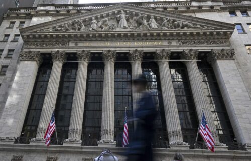 US stocks were mixed Thursday morning as President Donald Trump lashed out at Federal Reserve Chair Jerome Powell on social media.