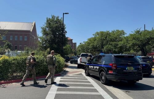 Law enforcement vehicles are stationed outside of Florida State University’s student union building after a shooting on the university campus on Thursday.
