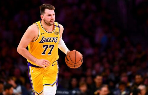 Dončić (left) scored 45 points in his first game back in Dallas earlier this month.