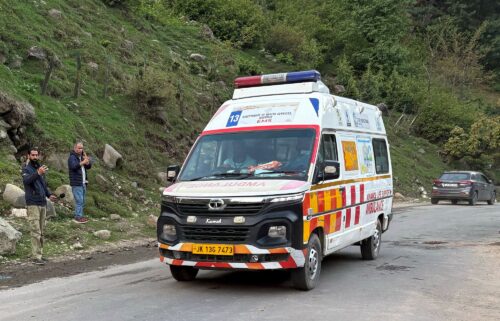 Indian security officers stand guard at a hospital in Jammu and Kashmir's Anantnag's district after assailants fired at tourists in the tourist destination of Pahalgam on Tuesday.