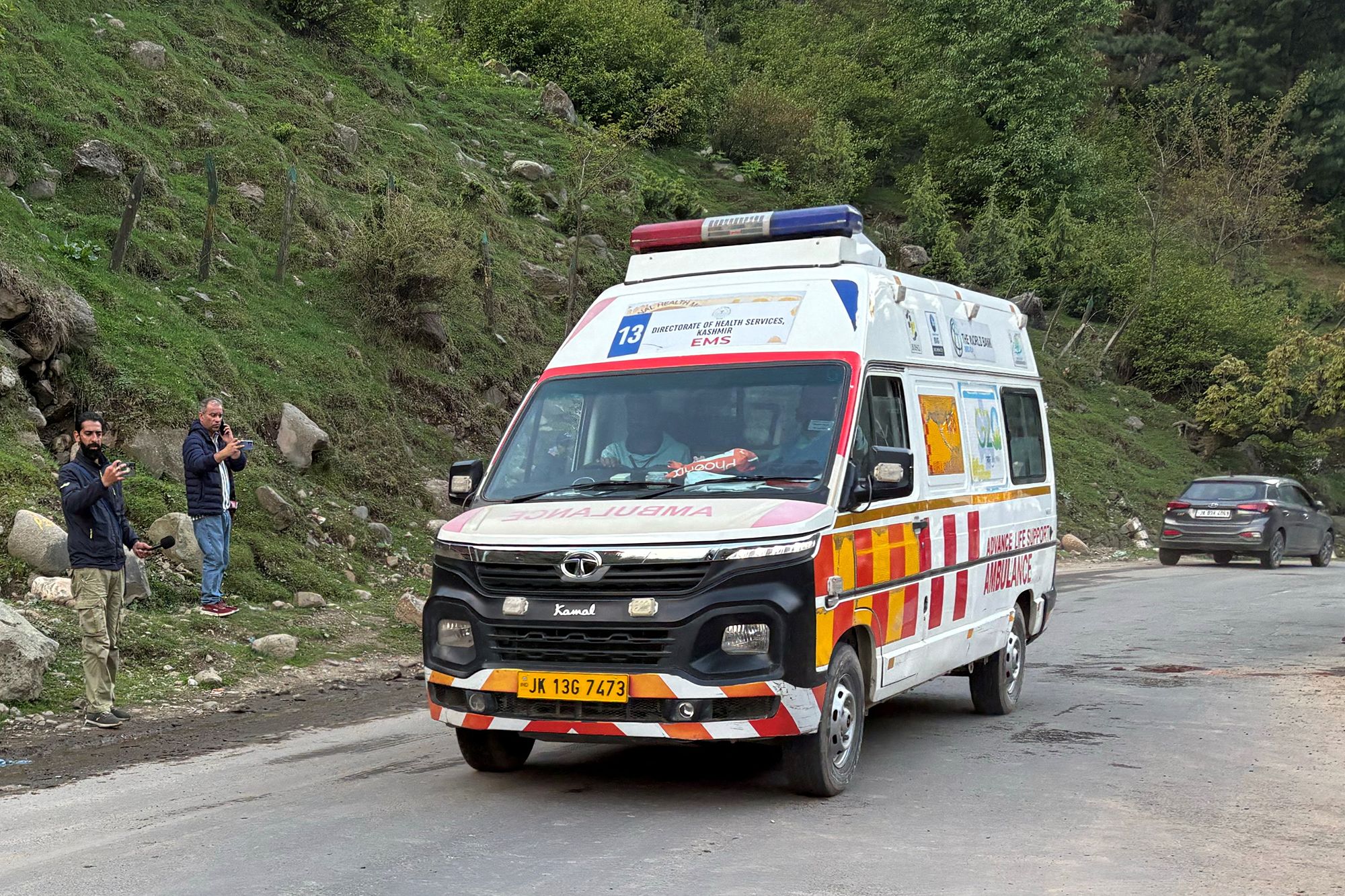 <i>Dar Yasin/AP via CNN Newsource</i><br/>Indian security officers stand guard at a hospital in Jammu and Kashmir's Anantnag's district after assailants fired at tourists in the tourist destination of Pahalgam on Tuesday.