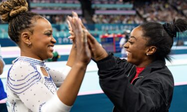 Andrade and Biles high-five after the women's artistic gymnastics vault final at the Paris 2024 Olympics in August.