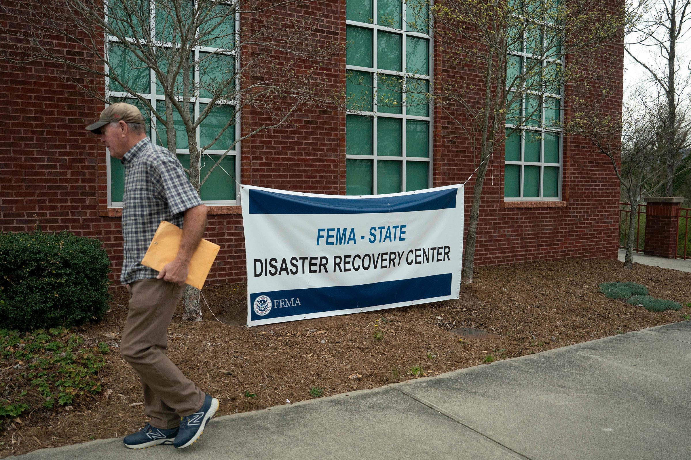 <i>Allison Joyce/Getty Images via CNN Newsource</i><br/>A sign is seen outside the FEMA Disaster Recovery Center at Weaverville Town Hall on March 29