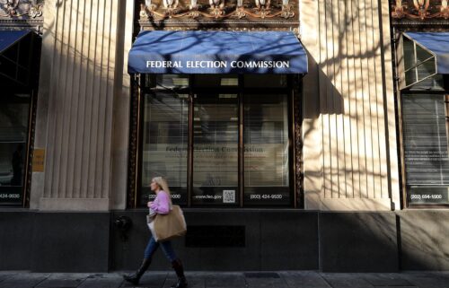 A pedestrian walks past the Federal Election Commission's headquarters in October 2016