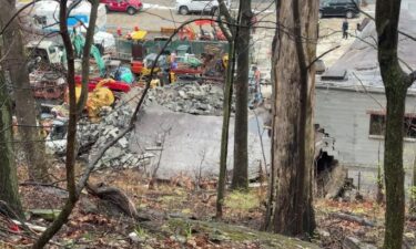 A large boulder caused a building to collapse Monday