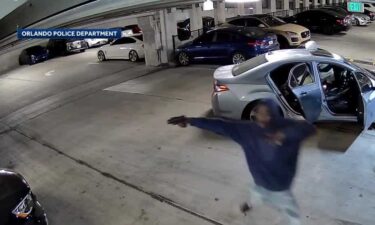 Video released Wednesday shows a shootout between multiple vehicles in an Orlando parking garage