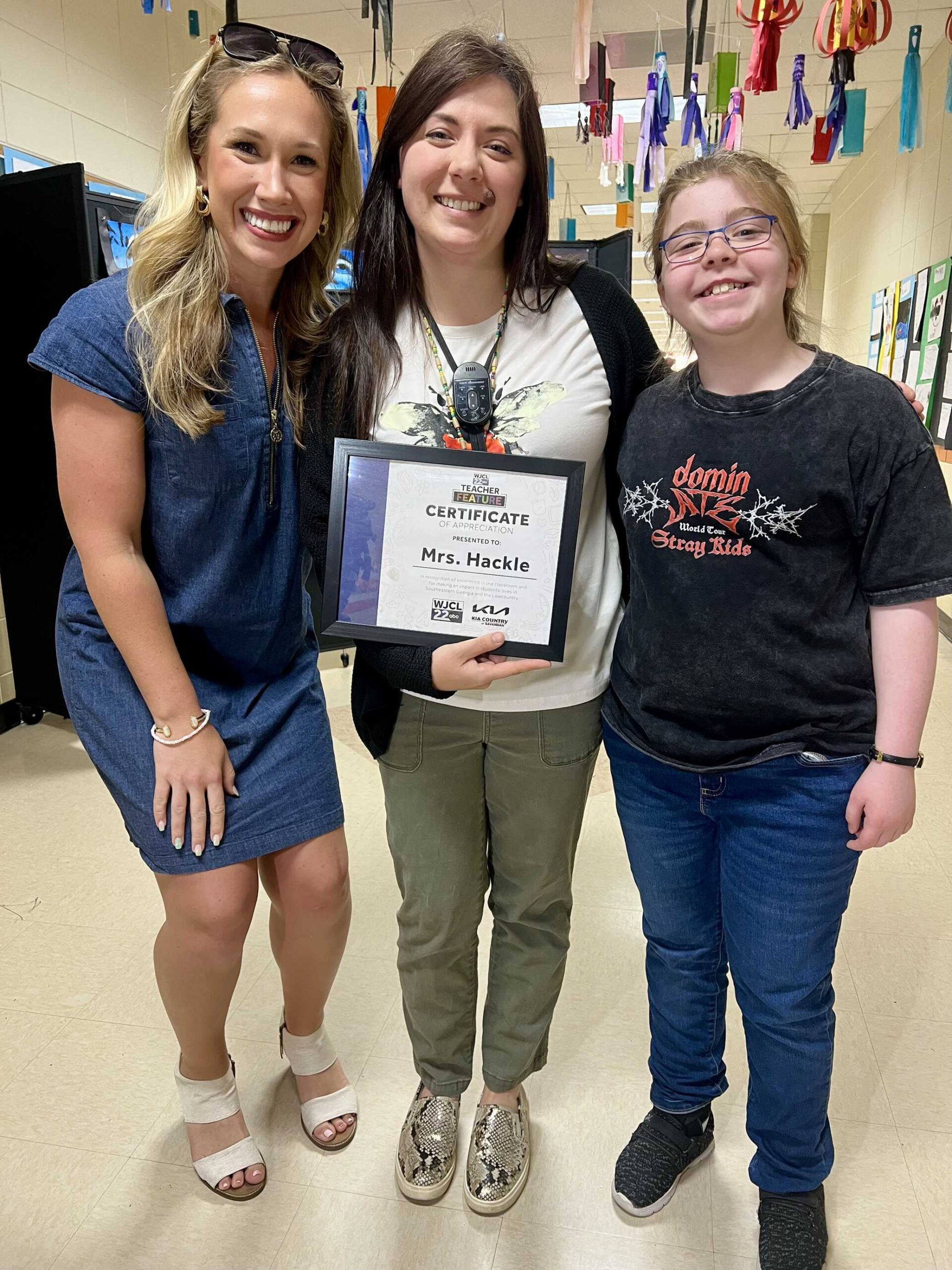<i>WJCL via CNN Newsource</i><br/>Leah Hackle with WJCL 22 News’ Emma Hamilton and her student