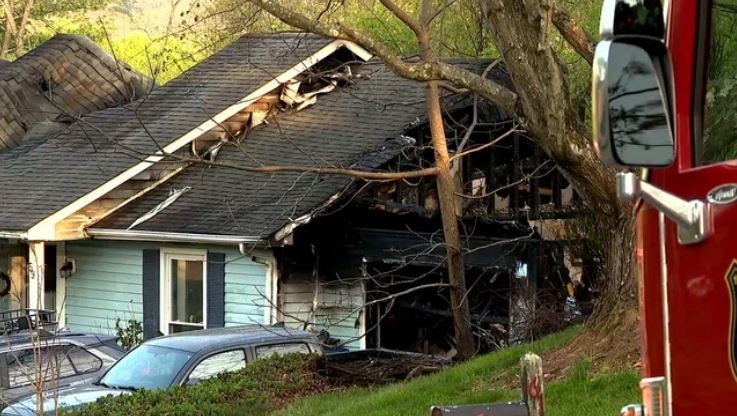 <i>WLOS via CNN Newsource</i><br/>One Buncombe County woman witnessed her neighbor's house fully engulfed in flames after hearing multiple explosions coming from a home on April 18.