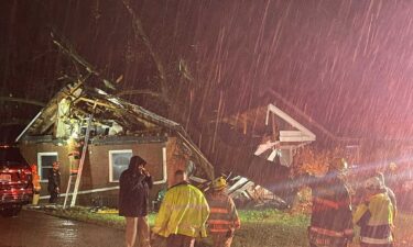 Officials on scene said one person was rescued after being trapped inside. That person had minor injuries. Two others were able to get out of the house on their own.