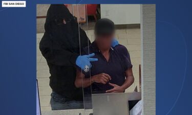 Surveillance photos of "The Blue Glove Bandit" during a bank robbery in El Cajon on September 4
